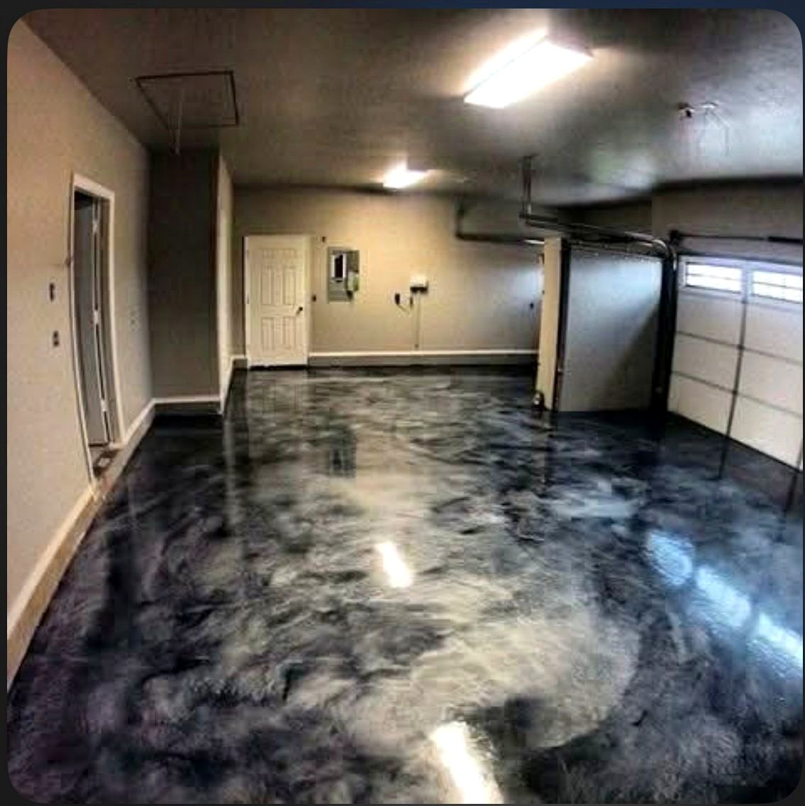 Smoke black decorative epoxy garage floor by AMM PAINTER LLC